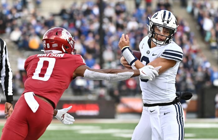 Oct 23, 2021; Pullman, Washington, USA; Brigham Young Cougars quarterback Jaren Hall (3) and Washington State Cougars defensive back Jaylen Watson (0) in the second half at Gesa Field at Martin Stadium. BYU won 21-19. Mandatory Credit: James Snook-USA TODAY Sports
